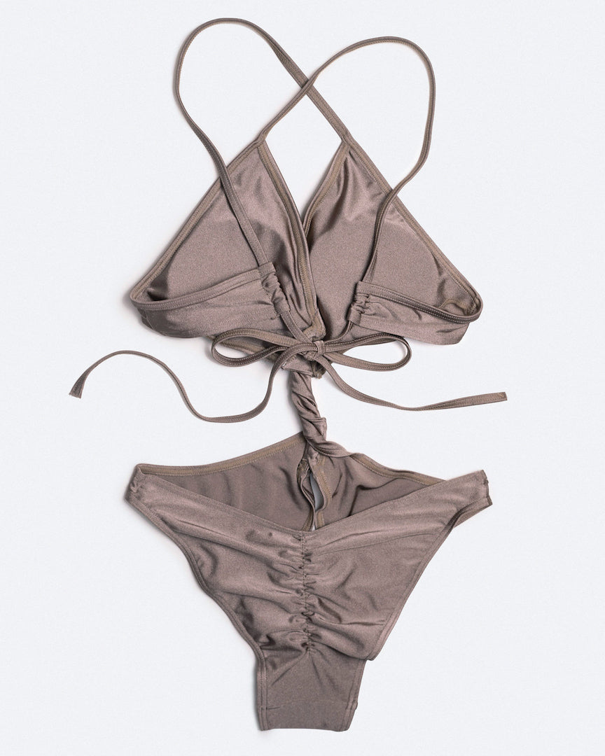 Lay flat back view of Matilda bodysuit in ash brown