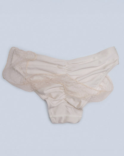 Back view of ivory Isabelle Bottom with fluid drape