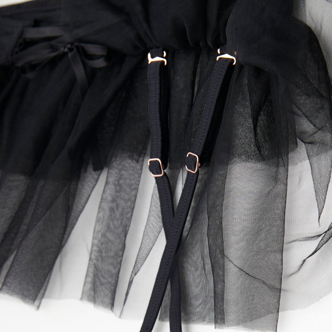 Detachable suspender detail on black tutu skirt