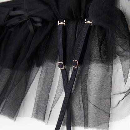 Detachable suspender detail on black tutu skirt