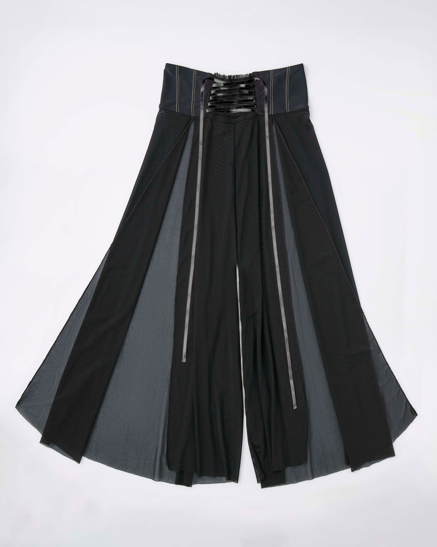 Front view of corset-inspired flowy pants in pink activewear