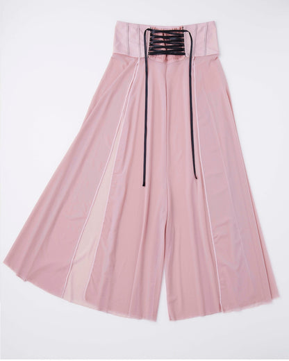 Front view of corset-inspired flowy pants in pink activewear