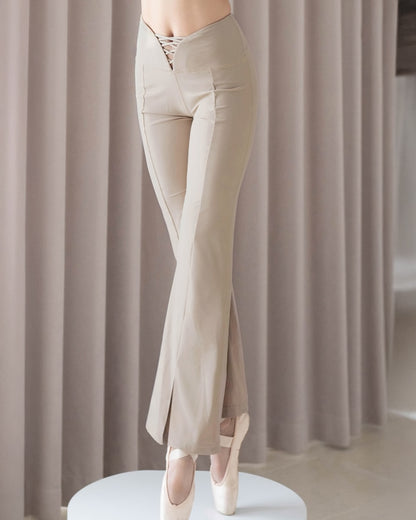 Taupe flare pants featuring Basque waistline and fluid leg silhouette